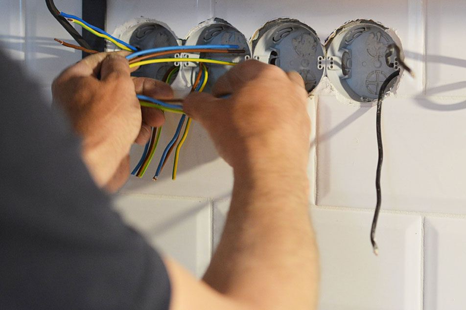Electrician fixing some wiring