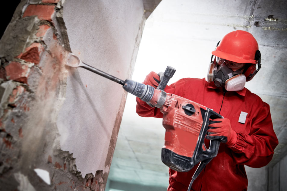 Construction Worker Jackhammer Brickwork